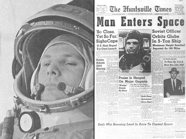Yuri Gagarin and accompanying news article — Photo Credit: NASA