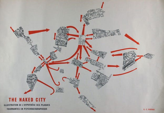 A photo of a cut up map, labeled The Naked City.