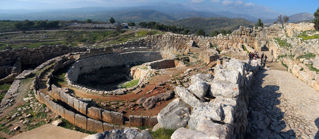 Figure 1 View of Grave Circle A (left) and the entrance to Mycenae (right)
Photograph by Andreas Trepte, www.photo-natur.ne