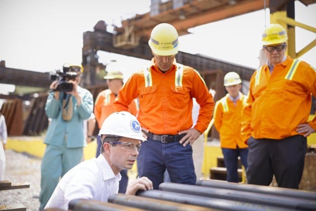 Secretary Buttigieg checks out American-made steel rails on tour
