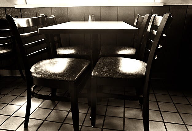 cafe table with chairs — photo: Judah S. Harris