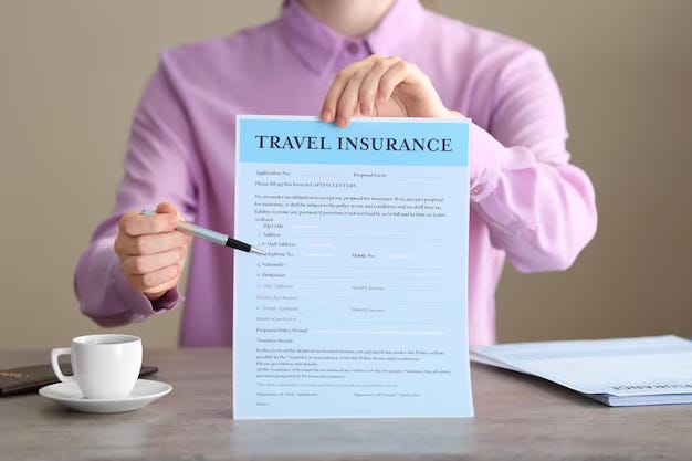 A man displaying a travel insurance form