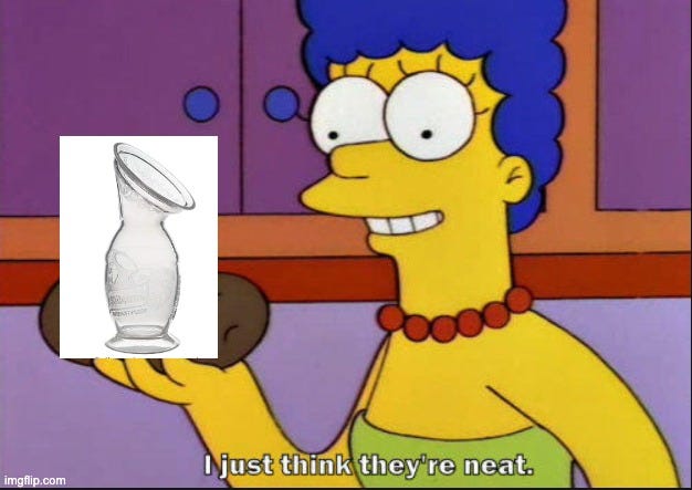 An image of Marge Simpson holding up a Haakaa breast pump with the caption ‘I just think they’re neat’
