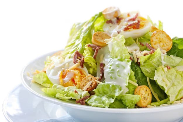 Salad prepared on a white plate