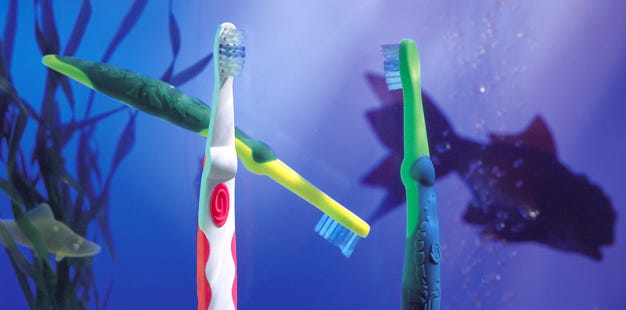 Kids toothbrushes showing the larger bottoms and handles