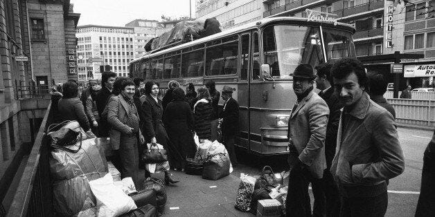 A group of Turkish workers waiting for the bus heading from Istanbul to Frankfurt