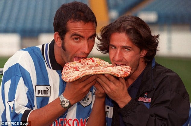 Paolo Di Canio and Benito Carbona eating pizza