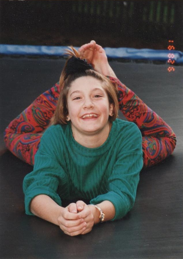 Sarah Klein, age 11, practicing on her backyard trampoline.