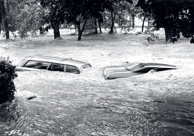 The Potomac River overflowed and picture shows two submerged cars in roiling water