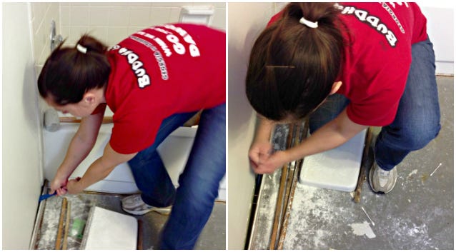 ripping out old flooring in master bath