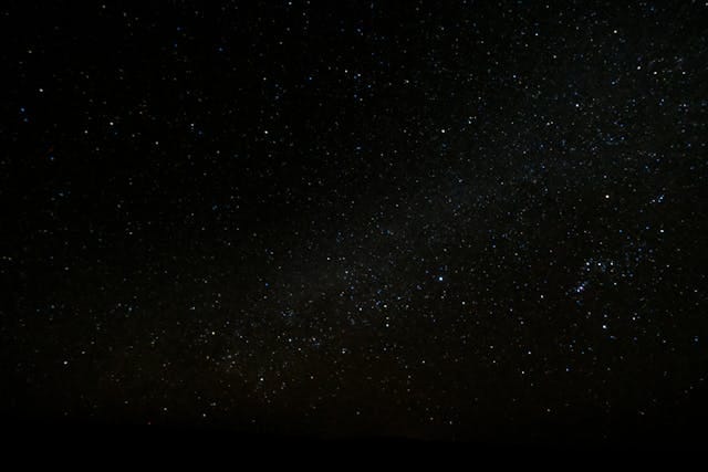1379 How many atoms are there in the vacuum of space-