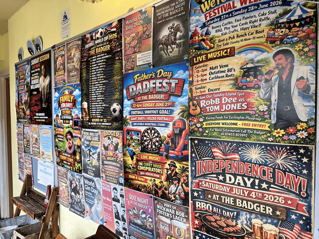 AI-created posters tacked to a wall that all look similar