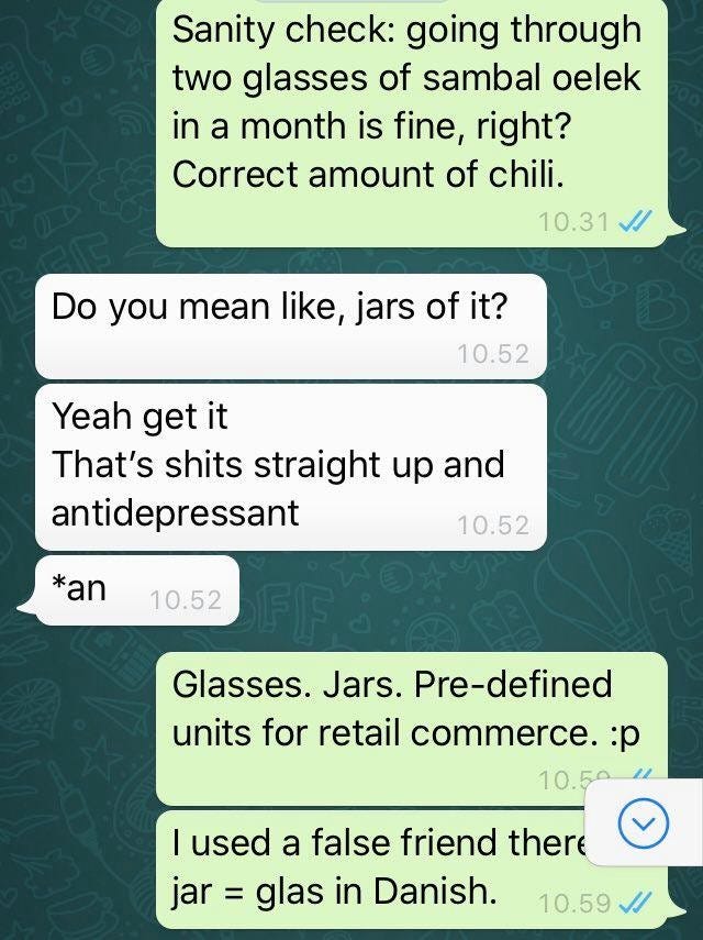 A screenshot of a WhatsApp conversation, where one person uses the word “glass” instead of “jar” because it’s a false friend.