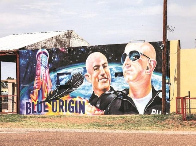 Mural displaying Jeff Bezos and his brother Mark in Van Horn, Texas, ahead of the scheduled launch of Blue Origin’s inaugural flight to the edge of space