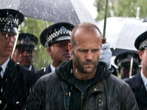 Statham swore revenge on the rain for getting his hair wet.