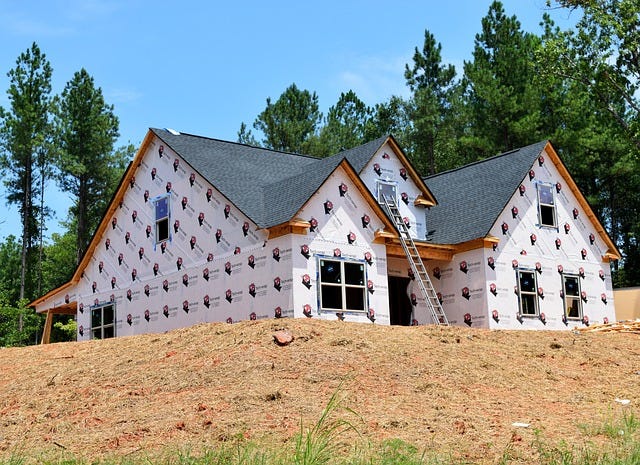 Roofing in Oshawa Ontario, wooden home under construction