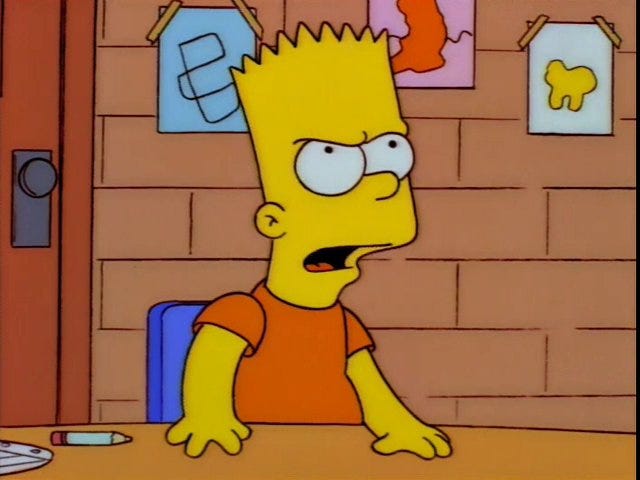 Bart Simpson stands from his desk in defiance.