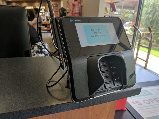 A point of sale terminal with the new chip reader.