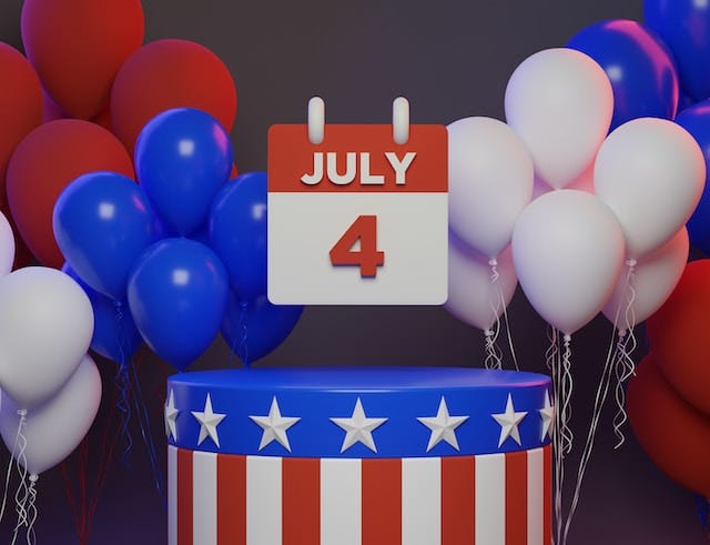 Fourth of July calendar with balloons and cake.