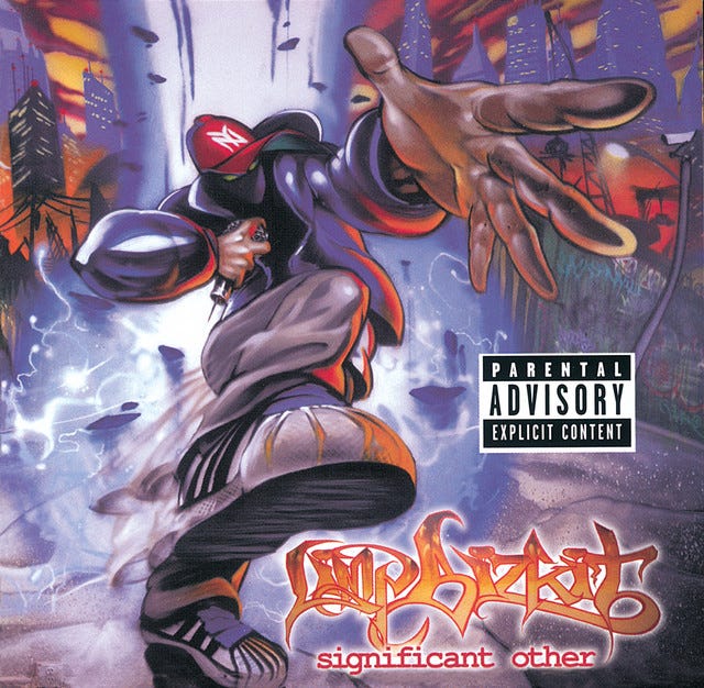 The album cover for Significant Other featuring a masked rapper in a hoodie and cap, holding a mic and making a pose towards the viewer.