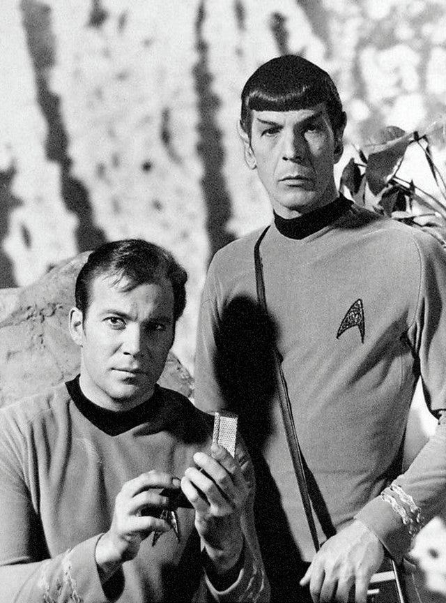 Black and white publicity photo of Captain Kirk and Mister Spock from Star Trek, TOS.