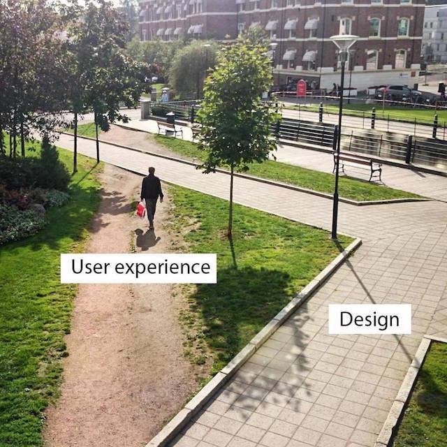 Meme showing design versus UX represented by a paved path contrasted with a trodden down trail in the grass