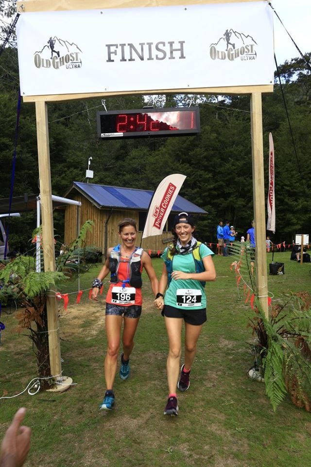 Crossing the finish line hand-in-hand at the Old Ghost Ultra in New Zealand.