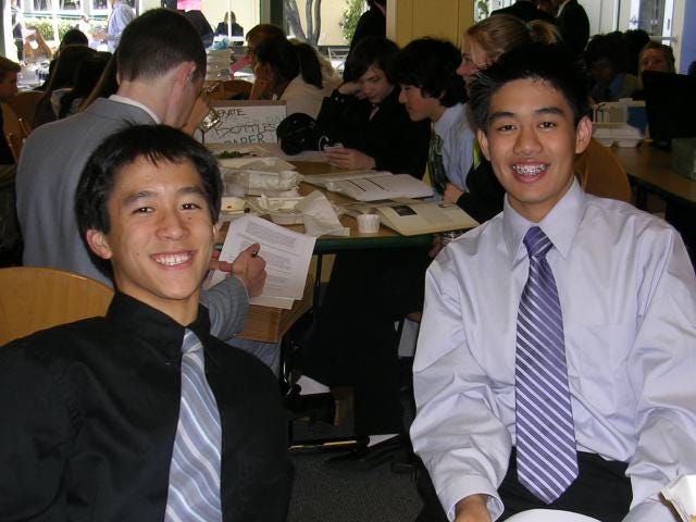 The author and his best friend at a high school debate tournament, circa 2004.