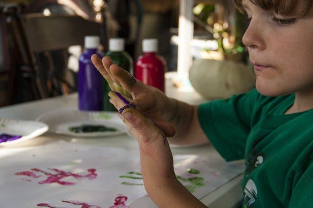 Image of boy painting