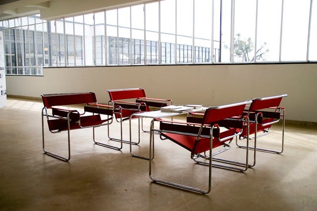 Four Wassily chairs sit in a room at the Bauhaus building in Dessau.