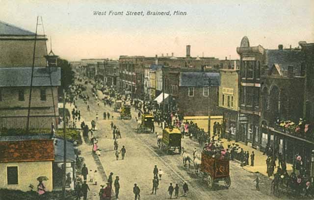Aerial view of busy Brainerd Street downtown in the early 20th Century. It is bustling and lively, without being overly crowded.