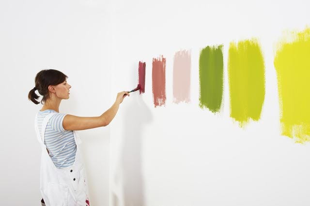 Painting different colors on a white wall