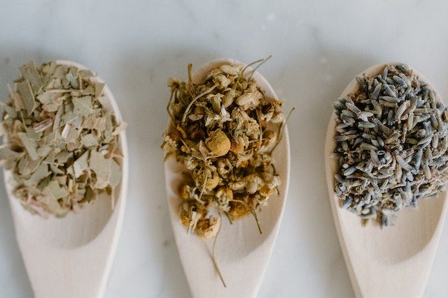 3 types of spices inside a spoon