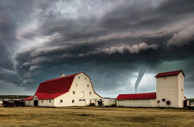 A tornado threatening a farm
