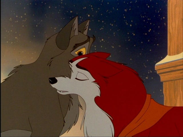 Balto and Jenna stand close together as she brushes against him.