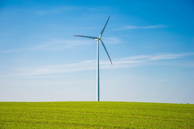 Image of a windmill harnessing wind energy