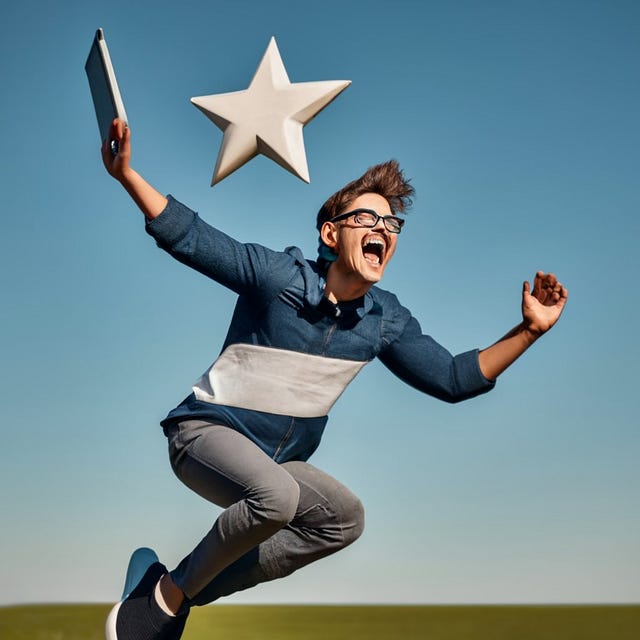 A man with a Macbook in his hand, very happy and jumping. “Star” is written above his head.