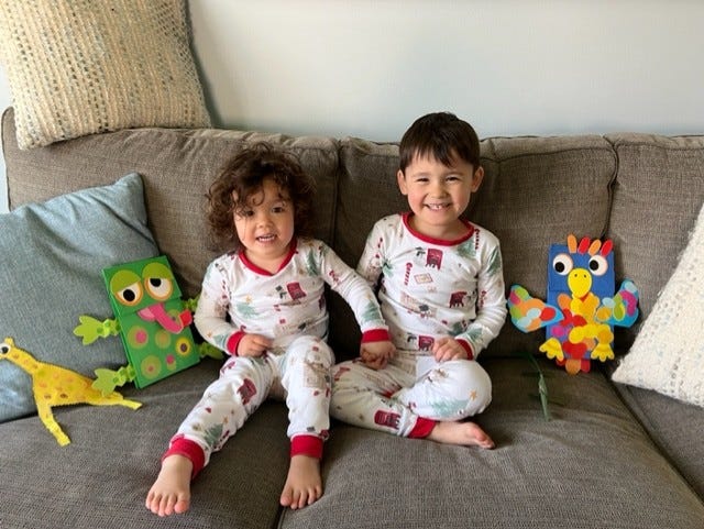 Two small children wearing pajamas