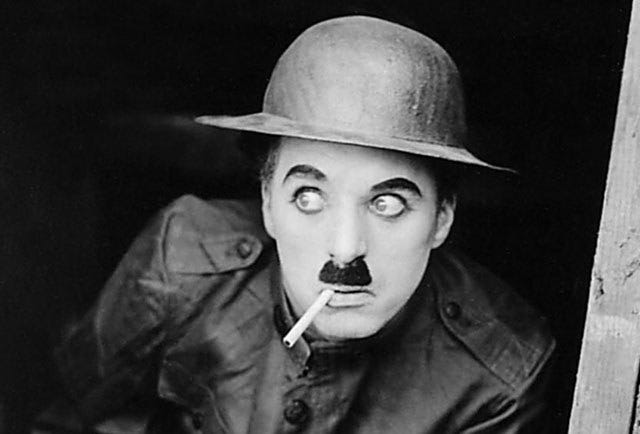Charlie Chaplin smoking