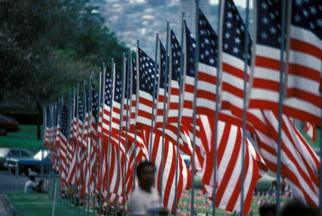 A photo of a row of US flags