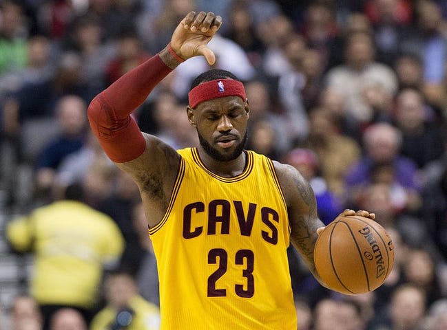 Cleveland_Cavaliers_forward_LeBron_James_takes_the_ball_up_court_against_the_Toronto_Raptors_21117_11976