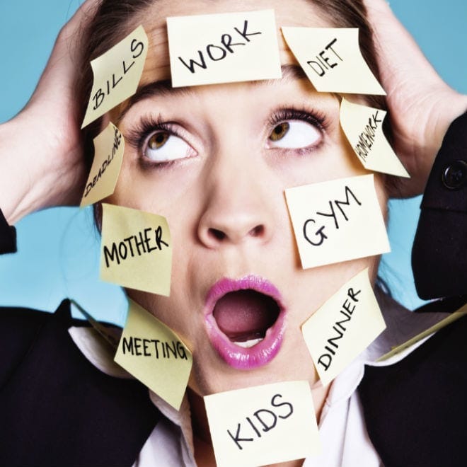 stressed out woman with sticky notes on her face to show terrible work life balance