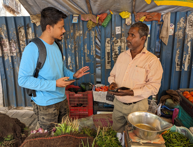 Talking with actual vegetable sellers.