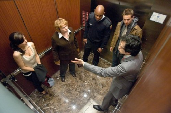 People stuck in an elevator.