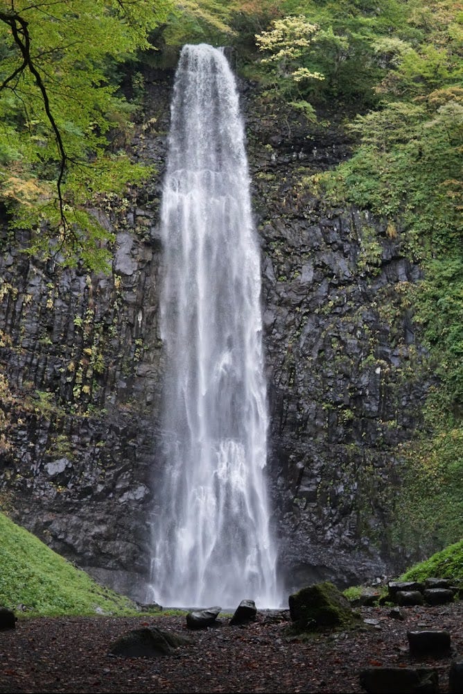 The huge 64m-tall Tamasudare waterfall during summer. Tamasudare is located in the east of Sakata City, Yamagata Prefecture, not too far from Mt. Kyogakura, one of the 100 Famous Mountains of Yamagata