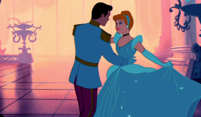 Cinderella in her beautiful, blue gown, dancing with the prince at the ball.