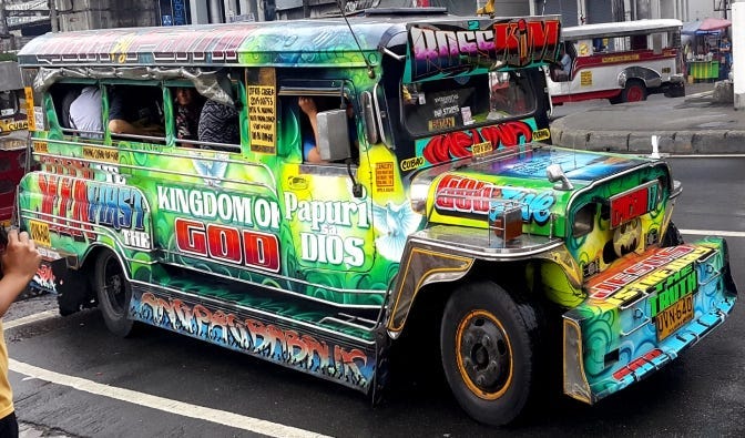 An extravagant jeepney with bold green colours and vibrant typography