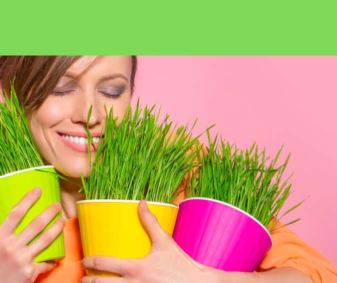 HodgeonRepeat blog — Weight Maintenance Matters — Smiling woman holding pots of grass