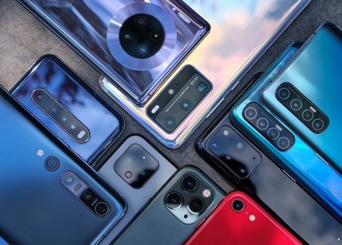 A pile of flagship phones, each with 3 to 6 cameras packed into them.
