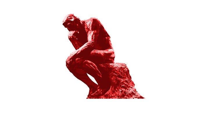 Thinker man sitting on a rock with arm curled under chin in a red hue